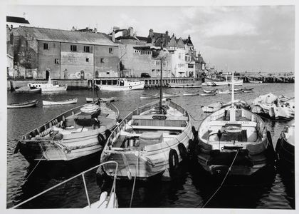 Bridlington Harbour, showing cobles in the foreground. Image originally used as one of the photographic illustrations in 