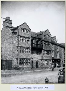 Olive Holliday and Eva Johnson on a walking tour, passing by Askrigg Old Hall. Photograph taken by MH c.1926. The Old Hall was burnt down in 1935. cp.drawing on page 100 of 
