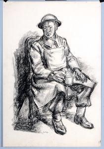 Soldier in kit with mug of tea