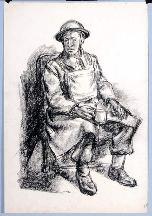 Soldier in kit with mug of tea