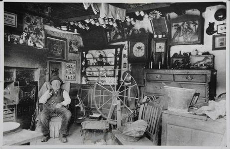 Timothy Feather (1825-1910), of Buckley Green, Stanbury, seen sitting in his 'house'. He was the last hand-loom weaver in that neighbourhood.  Image used for one of the photographic illustrations in 