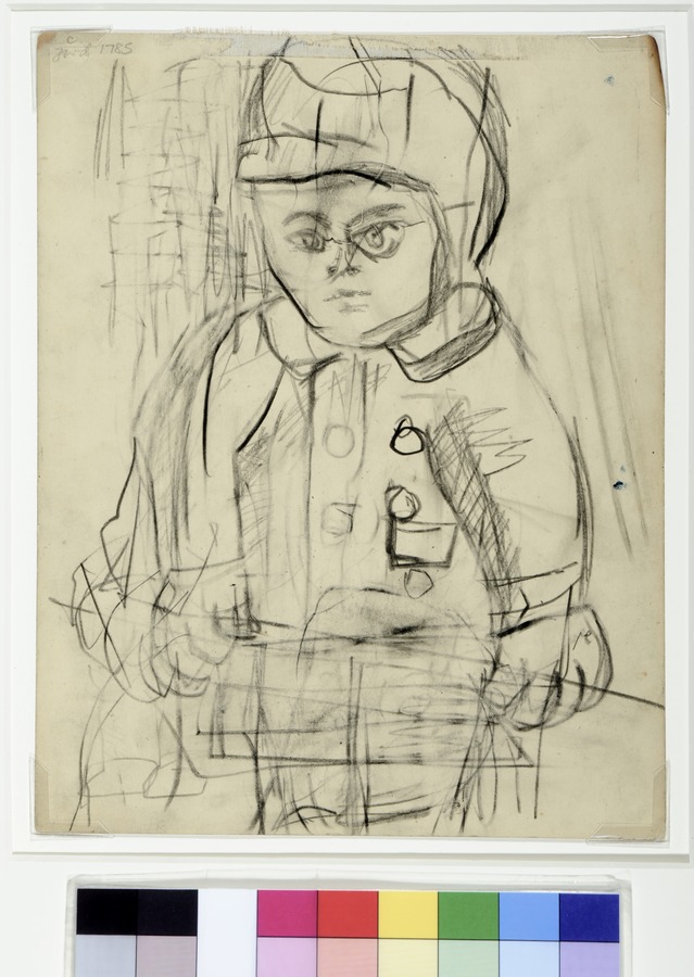 Young Boy Wearing Coat and Cap