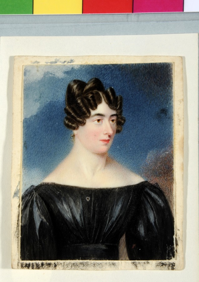 A lady in a black satin gown