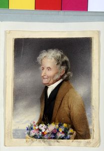 An elderly gentleman, with a basket of flowers