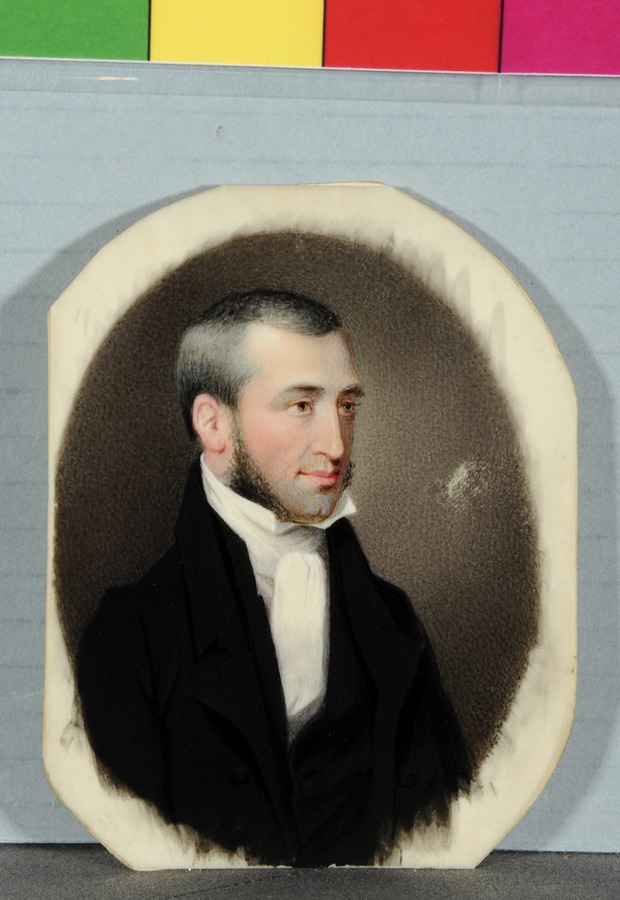 A gentleman with long side-whiskers